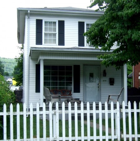 Two story tiny house that looks much bigger than it is.