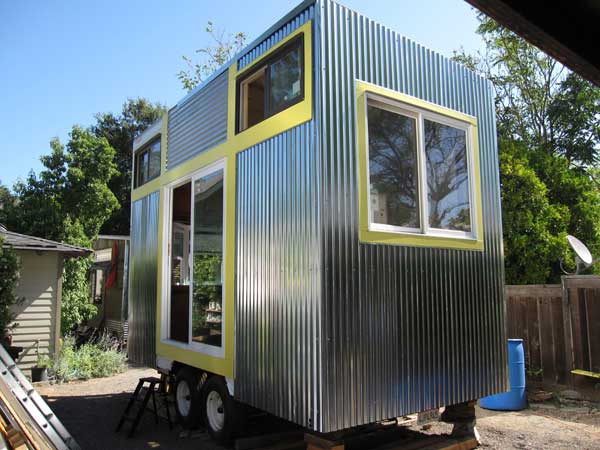 tiny shiny corrugated steel house
