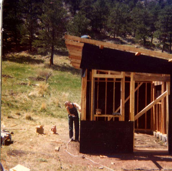 this is my mom working on building the chicken coop