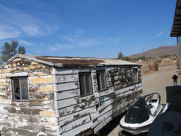 view of old tiny house roof