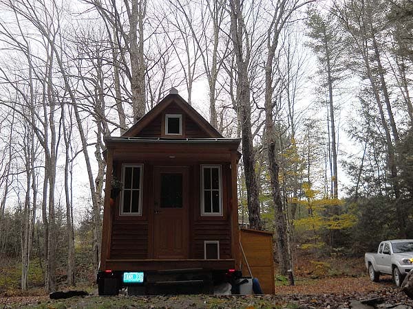 front of tiny house facing brook