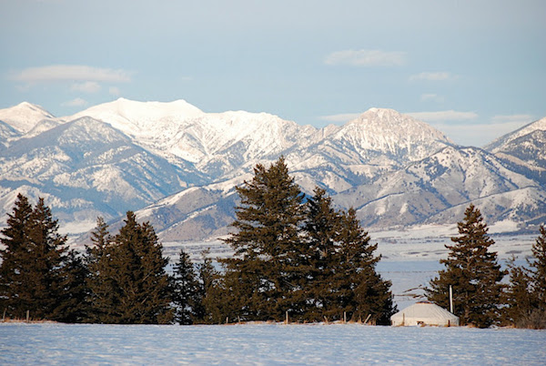 yurt and mountains