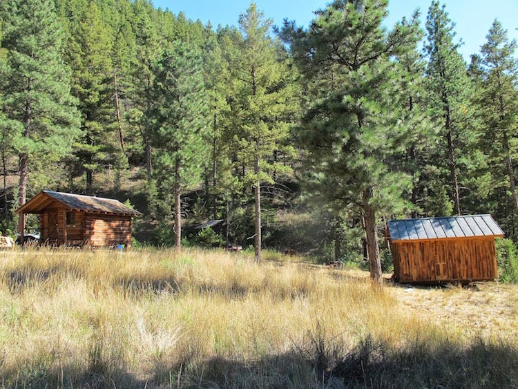 log cabin in a landscape