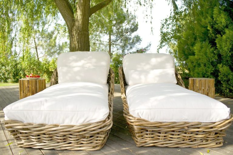 Chaise lounges outside in a garden