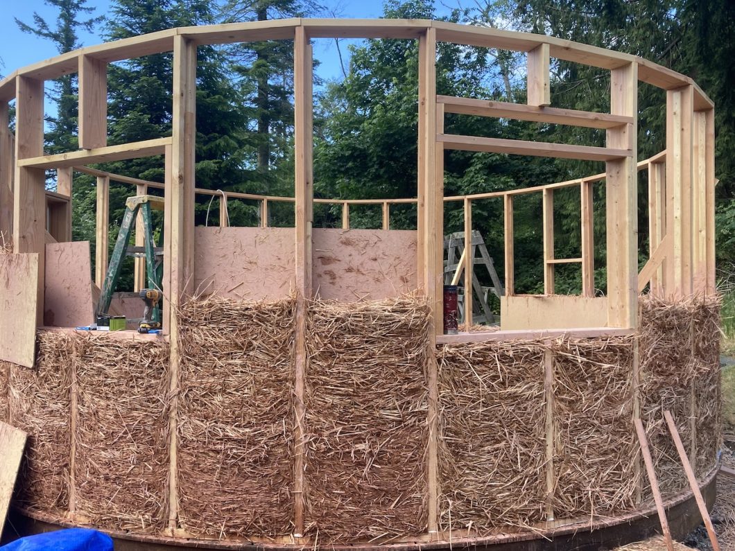 First course of slip straw around base-note1x1 key pieces placed along middle of studs