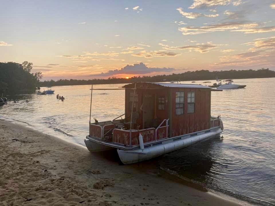 shanty boat at sunset
