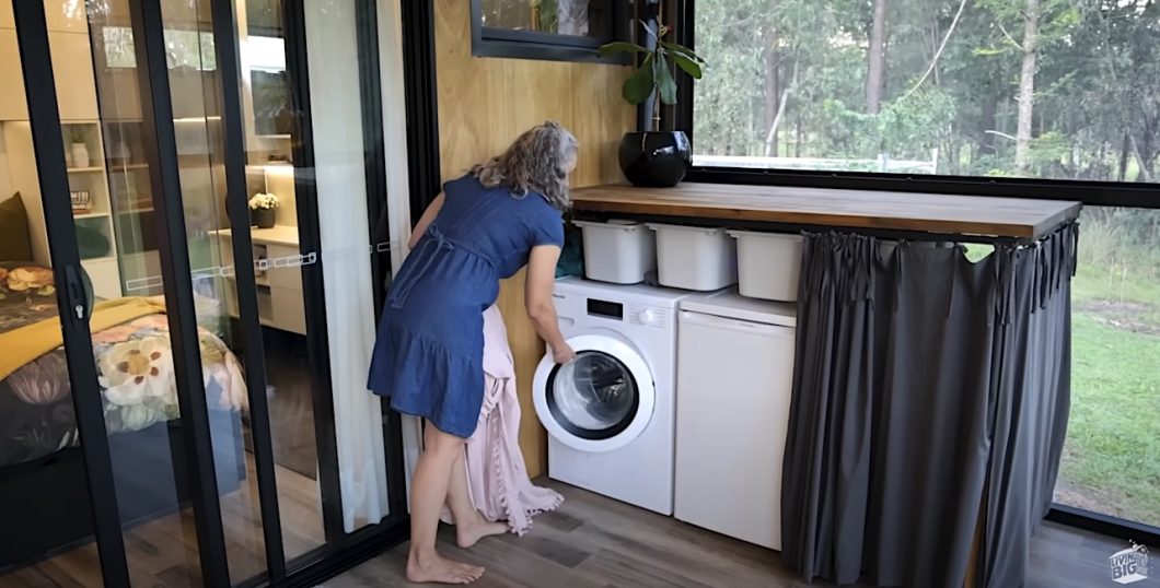 doing the laundry on the outdoor enclosed porch