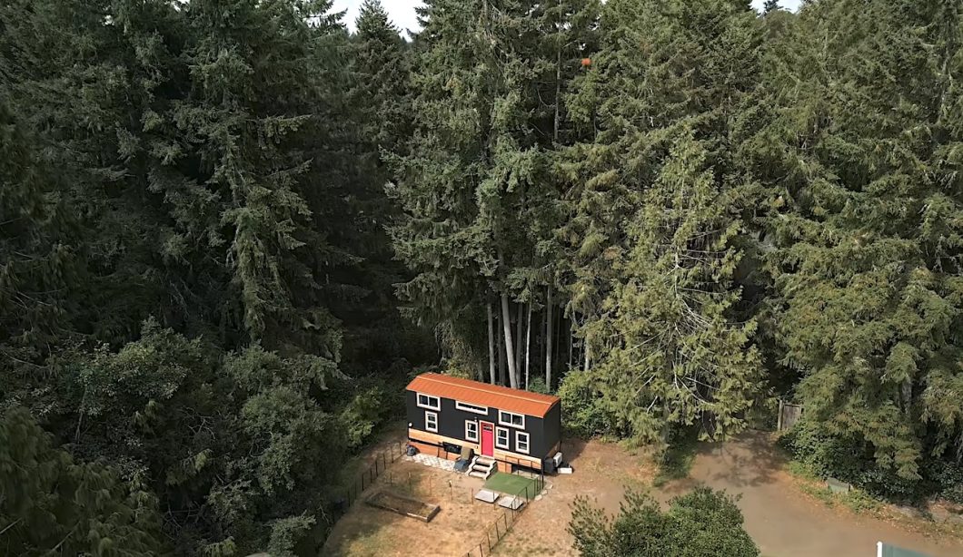 view of tiny house on property
